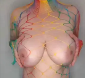 GIF - Every color of the rainbow barely covers my huge tits in this reveal