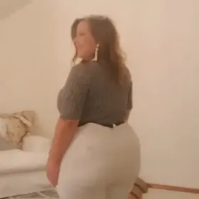 Mal strutting her stuff in some tight white pants