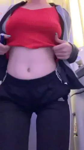 Cutie with short hair showing off her assets