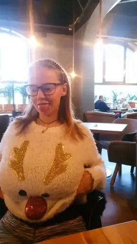 In a Christmas sweater with Rudolph and without the sweater.