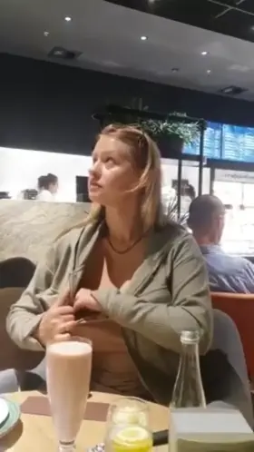 drinking coffee with my breast in the air