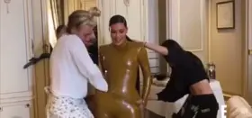 Struggling to get her fat ass into latex 😍😩