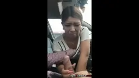 Amateur Japanese Girl Showing A Disgusted Face As She Sucks Dick In A Car