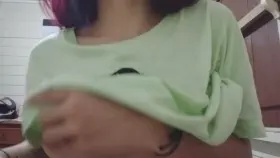 Horny girl flashing in the kitchen