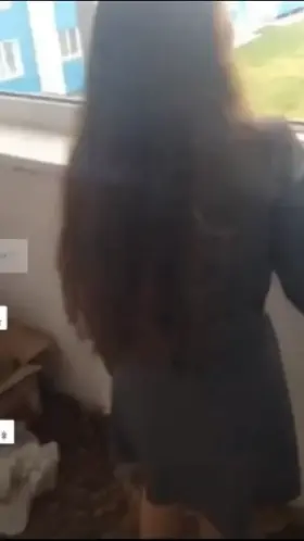 Upskirting her friend a little