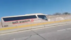 A couple having sex next to the highway