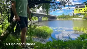 My man in a city park on the river