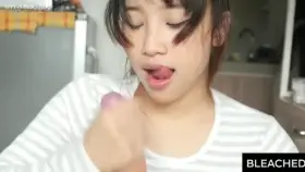An Unbelievable Cute Asian Girl Jerks A White Cock