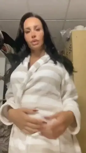 Big cock under her bathrobe. TS Kimberlee (gif)
