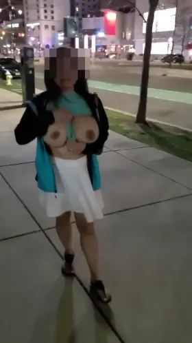 MILF Flashing Drivers Passing By and Getting Caught By One In A Parked Car