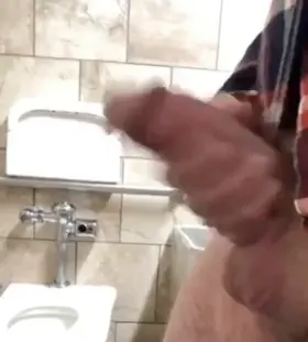 Stroking my forearm sized fat cock soft to hard at a public bathroom 😈🍆