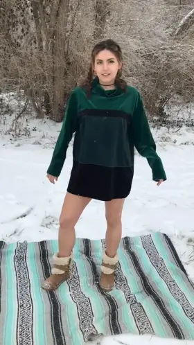 Getting undressed to play in the snow