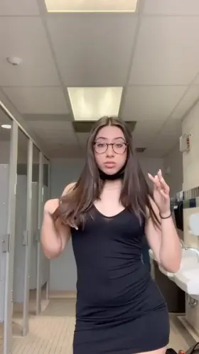 Barely legal teen shaking ass in bathroom