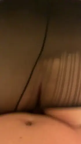 Grinding her ass in ripped pantyhose