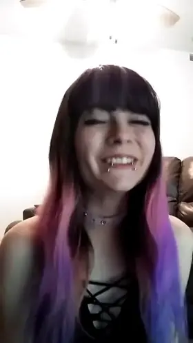 Black/Pink haired chick with lip piercings going uwu