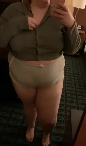 Unbuttoning my top while I’m bored in my hotel room