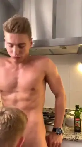 Blond hunks having fun in the kitchen