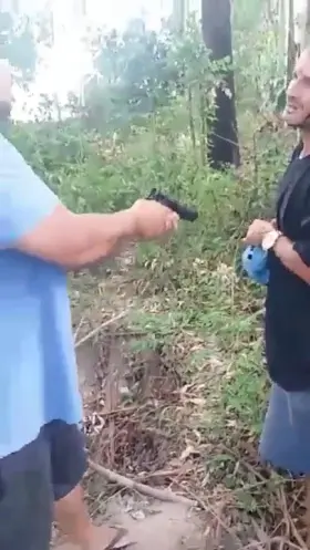 never be in debt in brazil. dude gets his hand ruined by a bullet and tries to run away only to receive a second one.