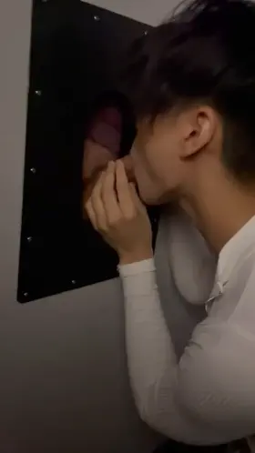 Sucking cock at the gloryhole while my gf films