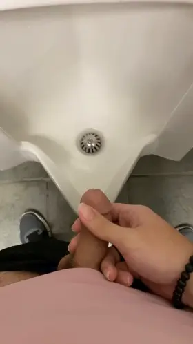 Pissing in a public urinal (if you want to see the rest check my OF in my bio)